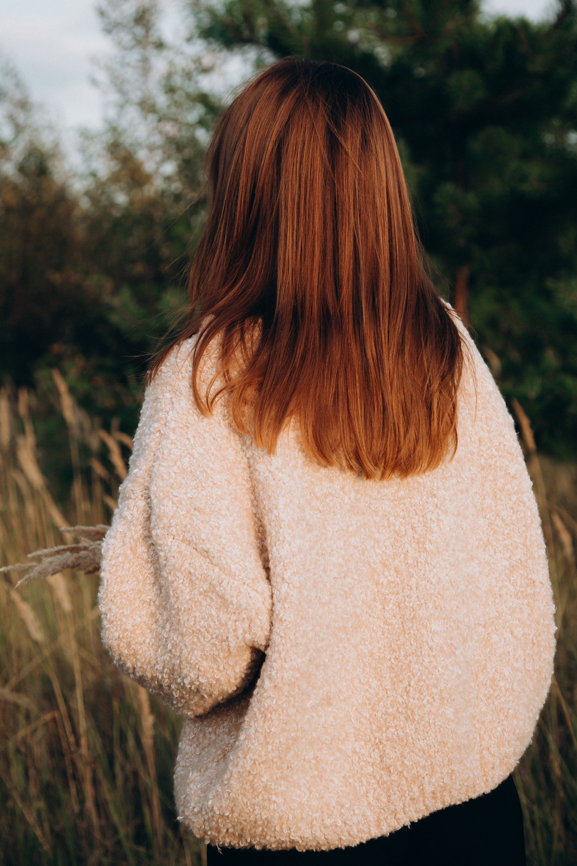 Sweter z wełny merynos bucle Nature Loop beżowy