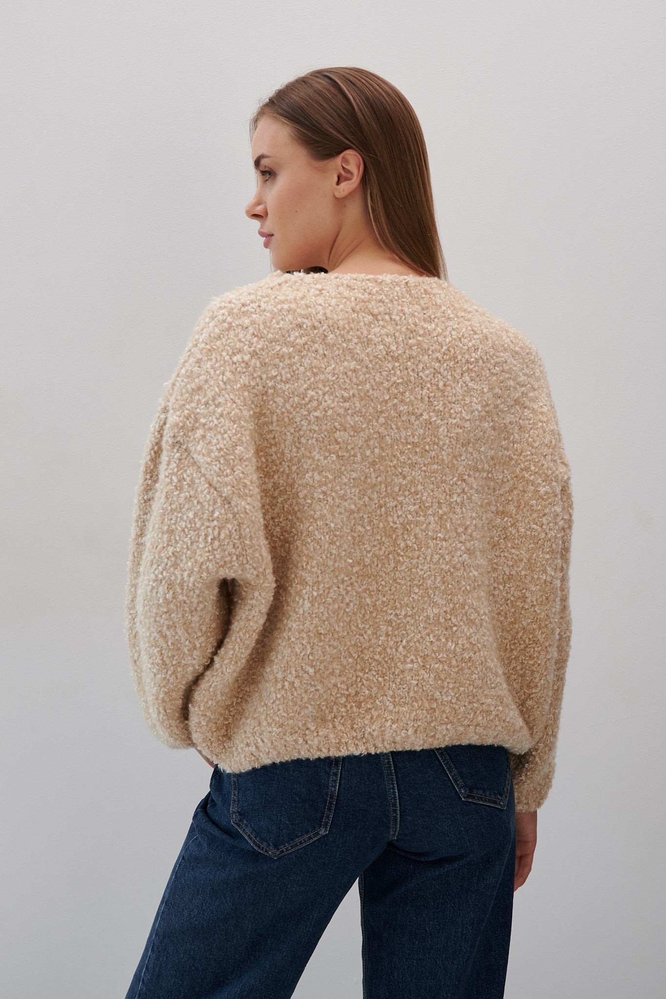 Sweter z wełny merynos bucle Nature Loop beżowy