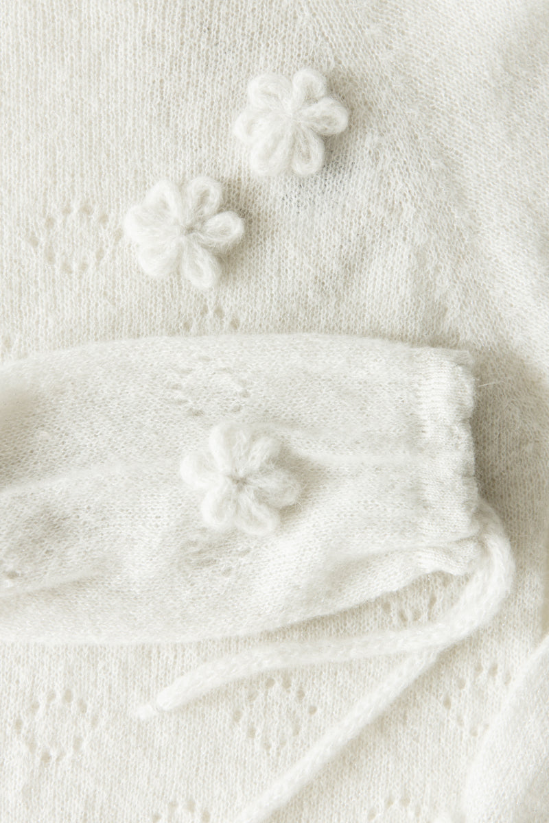 Elegant ecru hand-decorated suri wool sweater